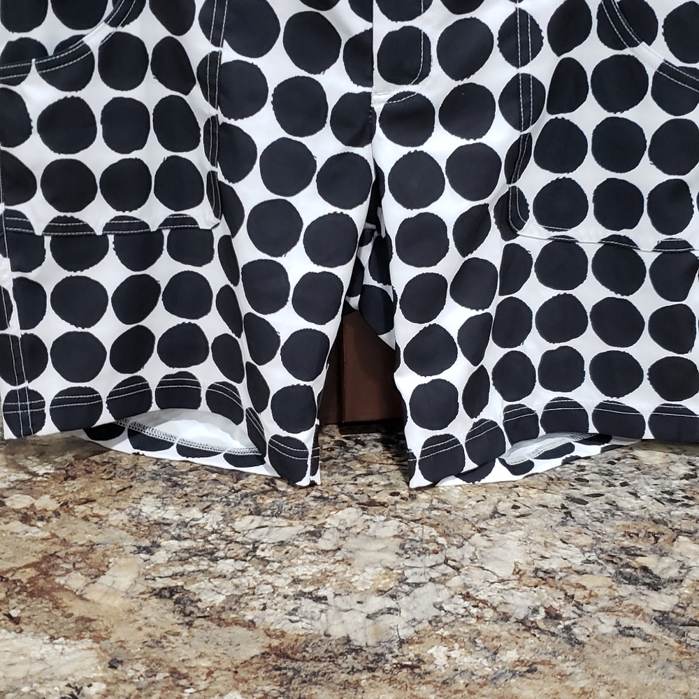 Black and white polka dotted golf shorts